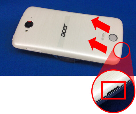 スマートフォンの側面のツメに指をかけ、外側に向かって矢印が示してある図